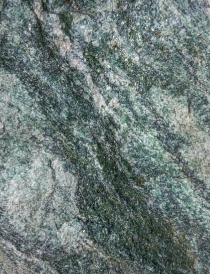 Full frame abstract marbled greenish mineral structure