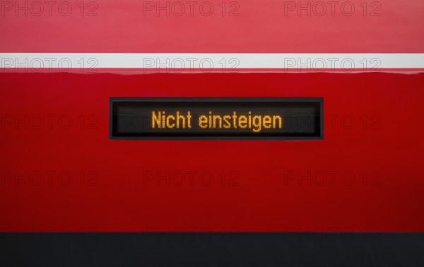 Nicht einsteigen lettering at a display om a train wagon in Germany