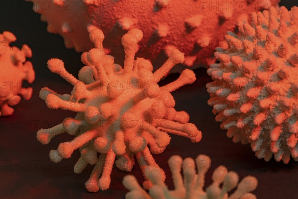Picture of some colorful illuminated symbolic viruses in dark back