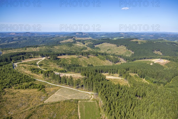Aerial view, forest area with forest damage, construction site at Dürrenberg with distant view near Albaum, Kirchhundem, Sauerland, North Rhine-Westphalia, Germany, construction work, construction area, building site, building plots, construction project, construction site, DE, Europe, aerial view, aerial photography, aerial photography, new building, overview, bird's-eye view, overview