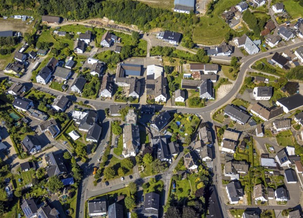 Aerial view, Heinsberg town centre and construction site and renovation work on the steeple of the Catholic parish church of St. Katharina, Heinsberg, Kirchhundem, Sauerland, North Rhine-Westphalia, Germany, construction work, construction area, construction site, scaffolding, building plots, construction project, construction site, DE, Europe, aerial view, aerial photography, aerial photography, new building, overview, bird's-eye view, overview