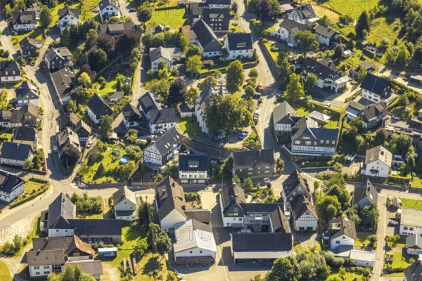 Aerial view, construction site and construction work with scaffolding at the heritage-protected catholic parish church St. Katharina in Heinsberg, Kirchhundem, Sauerland, North Rhine-Westphalia, Germany, place of worship, DE, Europe, religious community, place of worship, property tax, holy place, real estate, church, parish, denomination, aerial photograph, aerial photography, aerial photography, religion, religious site, overview, bird's-eye view, residential area, living and life, residential area, quality of life, residential neighbourhood, residential estate, residential district, birds-eyes view, overview
