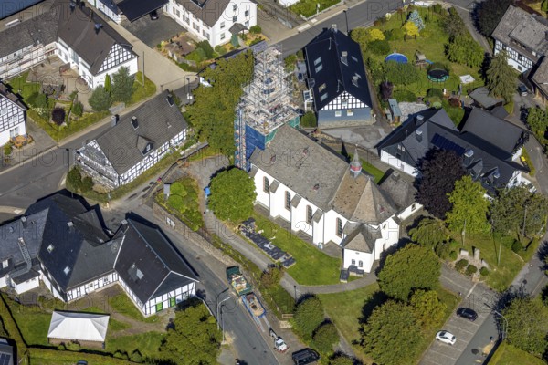 Aerial view, construction site and renovation work on the church tower of the Catholic parish church of St. Katharina, Heinsberg, Kirchhundem, Sauerland, North Rhine-Westphalia, Germany, construction work, construction area, construction site, scaffolding, building plots, construction project, construction site, DE, Europe, aerial view, aerial photography, aerial photography, new building, overview, bird's-eye view, bird's-eye view, overview