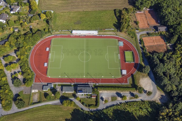 Aerial view, football stadium and athletics stadium, stadium at the Habuche and tennis court TC Grevenbrück 1975, Grevenbrück, Lennestadt, Sauerland, North Rhine-Westphalia, Germany, DE, Europe, football, football field, football stadium, Kirchhundem, aerial view, aerial photography, aerial photography, sports facility, sports field, tennis, tennis facility, tennis court, tennis courts, tennis club, overview, bird's-eye view, overview