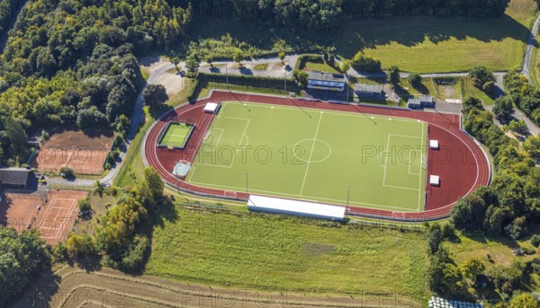 Aerial view, football stadium and athletics stadium, stadium at the Habuche and tennis court TC Grevenbrück 1975, Grevenbrück, Lennestadt, Sauerland, North Rhine-Westphalia, Germany, DE, Europe, football, football field, football stadium, Kirchhundem, aerial view, aerial photography, aerial photography, sports facility, sports field, tennis, tennis facility, tennis court, tennis courts, tennis club, overview, bird's-eye view, overview