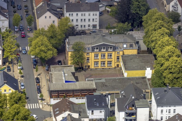 Aerial view, Grimmeschule, Städt. Confessional secondary school, Neheim, Arnsberg, Sauerland, North Rhine-Westphalia, Germany, municipal confessional secondary school, school, building, city, architecture, educational institution, terrain, surroundings, houses, roofs, streets, trees, infrastructure, city view, school building, education, district, aerial view, bird's eye view