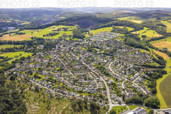 Aerial view, residential area local view Herdringen, forest area hilly landscape, Herdringen, Arnsberg, Sauerland, North Rhine-Westphalia, Germany, residential area, local view, forest area, hilly landscape, village, houses, nature, landscape, trees, settlement, architecture, rural, environment, area shot, sky, panorama, buildings, meadows, streets, roofs, environment, topographical, aerial view, neighbourhood, peaceful, small town, mountain region, idyllic