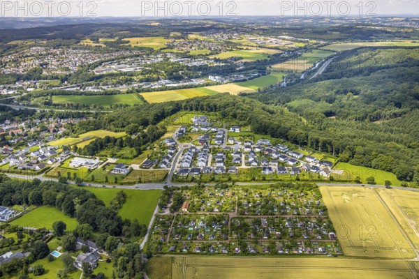 Aerial view, residential area Zum Dollberg, allotment garden association Neheim e. V., view of Neheim and Bachum, distant view with forest and meadows, Neheim, Arnsberg, Sauerland, North Rhine-Westphalia, Germany, DE, Europe, aerial view, aerial photography, aerial photography, Ruhr area, overview, bird's-eye view, bird's-eye view, overview
