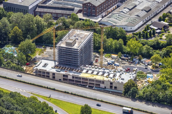 Aerial view, construction site with new Arnsberg town hall on the A46 motorway, Neheim, Arnsberg, Sauerland, North Rhine-Westphalia, Germany, construction site, new building, Arnsberg town hall, A46 motorway, infrastructure, architecture, urban development, construction work, construction cranes, buildings, traffic, roads, urban, city, region, construction, development, modern architecture, planning, construction progress, landscape, overview, engineering