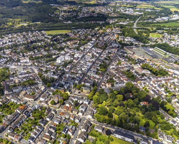 Aerial view, residential area on Hauptstraße with St. Johannes Baptist Church and Neheimer Markt, Grimmeschule, Neheim, Arnsberg, Sauerland, North Rhine-Westphalia, Germany, residential area, Hauptstraße, St. Johannes Baptist Church, Neheimer Markt, city, buildings, houses, streets, architecture, church, school, market, residential buildings, urban, infrastructure, German city, region, aerial view, summer, day, bird's eye view, landscape, public places, transport, community, neighbourhood, sightseeing, cultural, historical