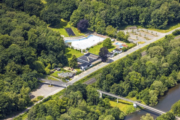 Aerial view, outdoor swimming pool Neheim, swimming pool without water, in the forest area at the river Ruhr, Neheim, Arnsberg, Sauerland, North Rhine-Westphalia, Germany, outdoor swimming pool, swimming pool, without water, forest area, river, Ruhr, nature, park, leisure, empty, outdoor area landscape, view, water pool, swimming pool, environment, green, recreation, forest, summer, outdoor pool, tranquillity, seclusion, rural, bird's eye view, architecture, infrastructure