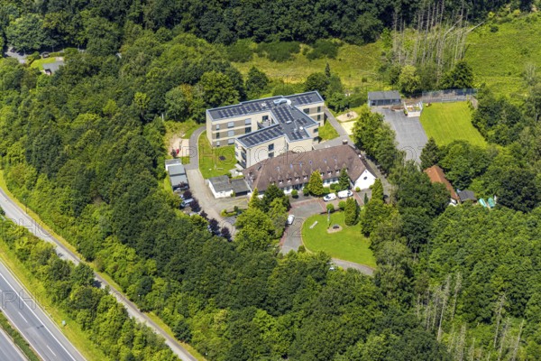 Aerial view, children and youth centre Marienfrieden with extension, Hüsten, Arnsberg, Sauerland, North Rhine-Westphalia, Germany, children and youth centre, Marienfrieden, extension, building, architecture, roof, environment, landscape, green, residential building, structure, development, district, infrastructure, aerial view, bird's eye view, institutional, youth, children, recreation, centre, community, urban, outdoor area, modern architecture, building, region