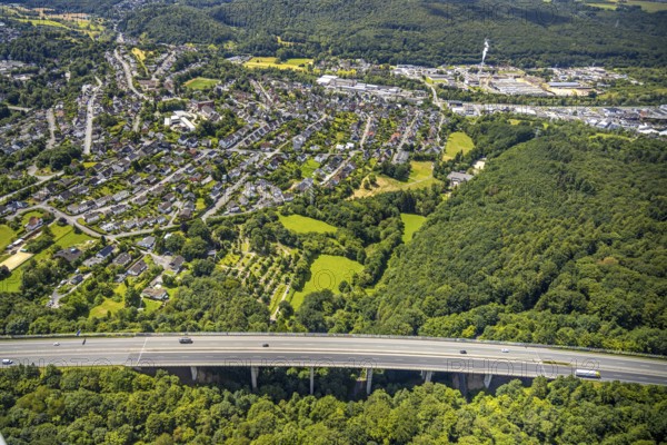 Aerial view, LSG landscape protection area Berbketal, motorway with bridge A46, residential area and forest area, Arnsberg, Sauerland, North Rhine-Westphalia, Germany, landscape protection area Berbketal, motorway, bridge, A46, residential area, forest area, nature, traffic, infrastructure, urban, rural, motorway bridge, road, trees, vegetation, houses, settlement, protected area, environment, landscape, green, geography, transport, aerial view, panorama, region, traffic, construction, environmental protection, outdoor shot, village, town, surroundings, European