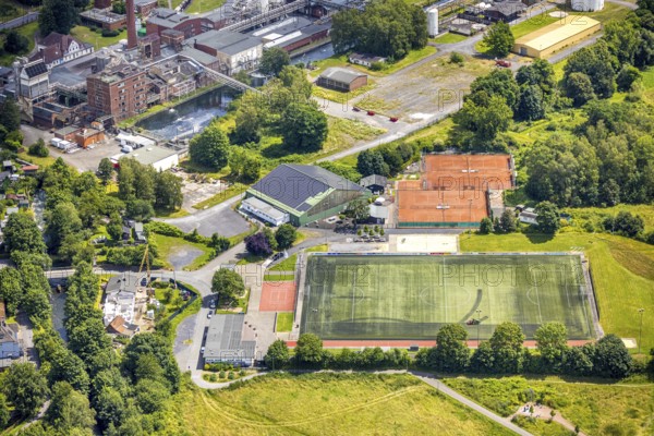 Aerial view, sports centre TuS Bruchhausen 02, football stadium and tennis courts, Bruchhausen, Arnsberg, Sauerland, North Rhine-Westphalia, Germany, sports centre, TuS Bruchhausen 02, football stadium, tennis courts, sport, facility, facilities, football, tennis, outdoor area, green areas, buildings, playing fields, architecture, leisure, recreation, infrastructure, club grounds, sports activities, community, aerial view, panorama, perspective above, structure, city view, surroundings, village, landscape, squares, summer, daytime