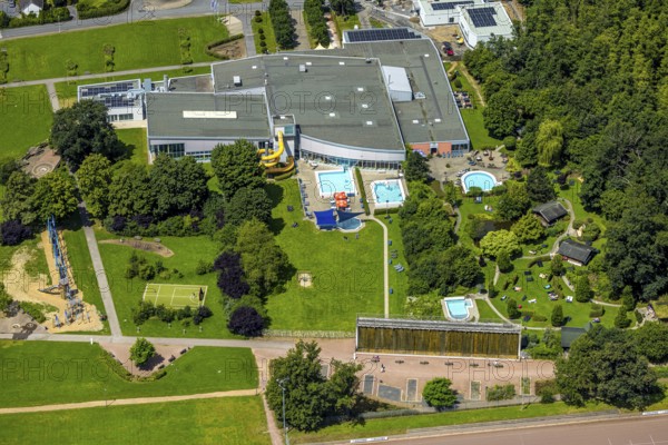Aerial view, Solepark Große Wiese leisure pool wet with water slide, sunbathing lawn and swimming pool, graduation house salt works, Hüsten, Arnsberg, Sauerland, North Rhine-Westphalia, Germany, Solepark, Große Wiese, leisure pool, water slide, sunbathing lawn, swimming pool, graduation house, salt works, outdoor pool, summer, leisure, recreation, landscape, pool, water, fun, swimming, tourism, nature, structure, infrastructure, park, green spaces, architecture, attraction, bird's eye view, Europe, relaxation