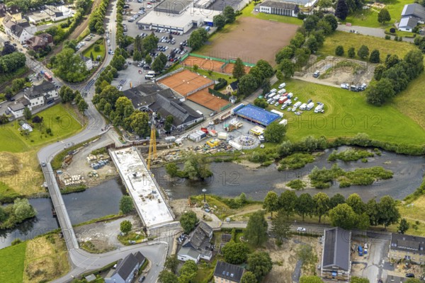 Aerial view, temporary bridge and construction site with new construction of the Dinscheder Ruhrbrücke Glösinger Straße (L735) over the river Ruhr and renaturalisation, Glösingen, Arnsberg, Sauerland, North Rhine-Westphalia, Germany, temporary bridge, construction site, new construction, Dinscheder Ruhrbrücke, Glösinger Straße, L735, river Ruhr, Renaturation, bridge, infrastructure, construction work, river, landscape, construction, environment, modernisation, transport project, summer, daylight, clouds, construction cranes, construction equipment, technology, architecture, nature, water, transport, urban development, region, development, aerial view, German city, project