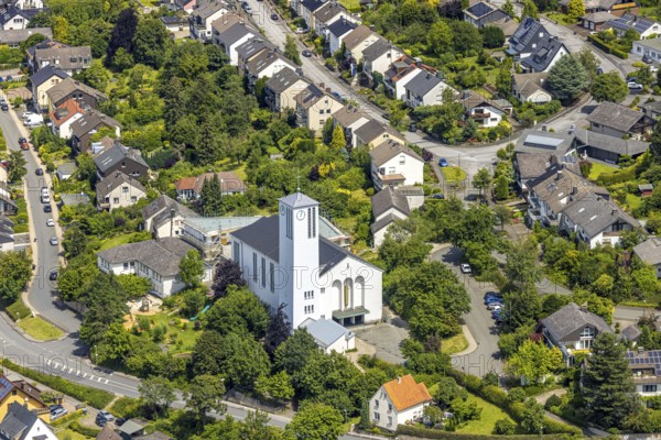 Aerial view, St. Pius Catholic Church, construction site behind the church, residential area terraced houses, Arnsberg, Sauerland, North Rhine-Westphalia, Germany, catholic church, St. Pius Church, construction site, residential area, terraced houses, architecture, religion, city, urban, construction, building, bird's eye view, village, community, church, habitat, modernisation, development, neighbourhood, infrastructure, landscape, typical, European, culture, residential buildings, real estate, planning, rural, perspective, village, structure