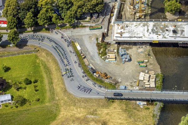 Aerial view, Schützenverein street parade, St. Sebastianus Schützenbruderschaft 1766 e.V. Öventrop, Glösingen, Arnsberg, Sauerland, North Rhine-Westphalia, Germany, Schützenverein, street parade, St. Sebastianus Schützenbruderschaft, Öventrop, procession, celebration, tradition, culture, uniforms, march, community, association, men, woman, children, flags, band, brass band, parade, village, historical, holiday, venue, daylight, summer, crowd, festivities, regional tradition, home, ceremony, guard of honour, custom, public space