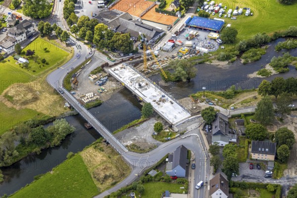 Aerial view, temporary bridge and construction site with new construction of the Dinscheder Ruhrbrücke Glösinger Straße (L735) over the river Ruhr and renaturalisation, Glösingen, Arnsberg, Sauerland, North Rhine-Westphalia, Germany, temporary bridge, construction site, new construction, Dinscheder Ruhrbrücke, Glösinger Straße, L735, river, Ruhr, renaturation, infrastructure, construction work, water, bridge, engineering, river landscape, construction project, aerial view, urban development, architecture, nature, traffic, bridge construction, modernisation, technology, landscape, riverbank, geography, restoration, environment, civil engineering