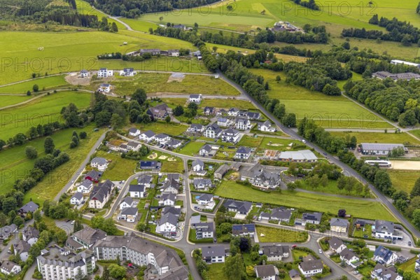 Aerial view, new residential area Am Sengelsberg, below the house at Sähling - evangelisches Johanneswerk nursing home, Bad Berleburg, Wittgensteiner Land, North Rhine-Westphalia, Germany, Am Sengelsberg, architecture, exterior view, trees, roofs, development, building, community, green spaces, house, real estate, infrastructure, Johanneswerk, landscape, new construction, care facility, nursing home, settlement, summer, city, urban planning, streets, Sähling, daylight, urban, residential area, residential houses, evangelical, rural, modern, above