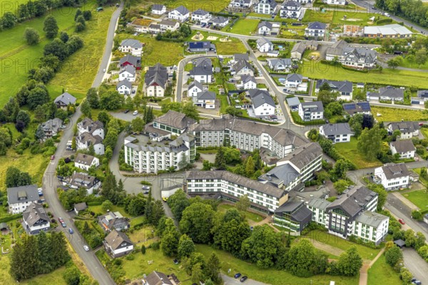 Aerial view, Haus am Sähling - evangelisches Johanneswerk nursing home, new building residential area Am Sengelsberg, Bad Berleburg, Wittgensteiner Land, North Rhine-Westphalia, Germany, Am Sengelsberg, architecture, exterior view, village, Evangelisches Johanneswerk, building, community, green area, house, house roofs, sky, infrastructure, landscape, neighbourhood, new building, care, nursing home, region, retirement home, settlement, town, Sähling, day, residential area, residential building, residential complex, living space, European, peaceful, modern