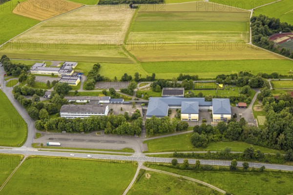 Aerial view, Ludwig-zu-Sayn-Wittgenstein-Schule Hauptschule und Städt. secondary school, meadows and fields, Bad Berleburg, Wittgensteiner Land, North Rhine-Westphalia, Germany, architecture, exterior, educational institution, trees, village, fields, spring, building, green, secondary school, sky, landscape, agriculture, Ludwig-zu-Sayn-Wittgenstein-Schule, nature, secondary school, region, school, school grounds, summer, daylight, surroundings, meadows, German school system, European, peaceful, rural, vegetation, overview