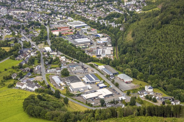 Aerial view, commercial area Unterm Limburg with sewage treatment plant, residential area Bad Berleburg, Wittgensteiner Land, North Rhine-Westphalia, Germany, wastewater treatment, architecture, Bad Berleburg, view from above, roofs, development, Europe, building, municipality, commercial area, green area, sky, houses, industry, infrastructure, sewage treatment plant, landscape, aerial view, nature, order, organisation, region, settlement, town, streets, structure, environment, Unterm Limburg, urban, administration, residential area, residential buildings, German culture, sustainable development