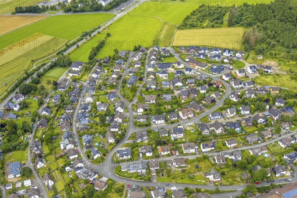 Aerial view, residential area between Stöppelsweg and Wittgensteiner Straße, Raumland, Bad Berleburg, Wittgensteiner Land, North Rhine-Westphalia, Germany, architecture, tree, roofscape, village, detached houses, municipality, geography, green spaces, houses, infrastructure, landscape, neighbourhood, province, settlement, streets, urban, Stöppelsweg, surroundings, bird's eye view, Wittgensteiner Straße, residential area, residential houses, German town, European, rural, natural habitat