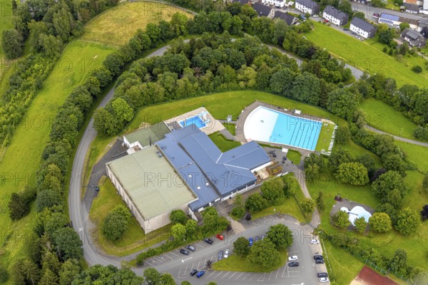 Aerial view, Rothaarbad outdoor pool, Rothaar Wellenfreibad, Bad Berleburg, Wittgensteiner Land, North Rhine-Westphalia, Germany, architecture, outdoor area, trees, roof, drone shot, refreshment, recreation, outdoor pool, leisure, leisure facility, building, green areas, infrastructure, landscape, nature, Rothaarbad, swimming pool, summer, sports, city, tourism, environment, bird's eye view, water, European, open air, swimming
