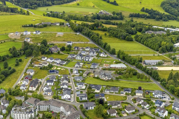 Aerial view, new residential area Am Sengelsberg, below the Haus am Sähling - Evangelisches Johanneswerk nursing home, Bad Berleburg, Wittgensteiner Land, North Rhine-Westphalia, Germany, Am Sengelsberg, architecture, roofs, development, Evangelisches Johanneswerk, building, health, green spaces, house, infrastructure, landscape, aerial view, modernisation, neighbourhood, new construction, nursing facility, nursing home, religion, settlement, urban development, urban planning, streets, urban, urban, residential complex, residential area, residential buildings, Protestant