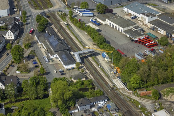 Aerial view, Bestwig railway station, Deutsche Bahn AG, construction site with construction crane, pedestrian crossing covered, Bestwig, Sauerland, North Rhine-Westphalia, Germany, Deutsche Bahn, construction site, construction crane, pedestrian crossing, covered, railway, train, infrastructure, construction work, urban, city, transport, traffic, building, bridge, architecture, construction, rails, road, landscape, industry, local transport, public, structure, aerial view, modern, commuter, technology, construction project, long-distance traffic
