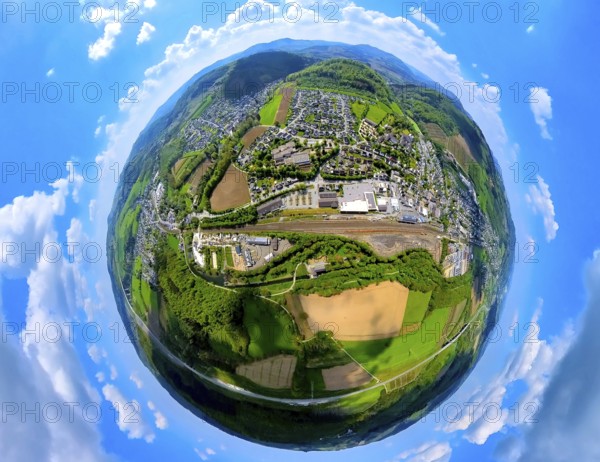 Aerial view, residential area local view and Bestwig Zum Alten Güterbahnhof and railway tracks, shopping centre with Rewe supermarket and Aldi supermarket, above the mountain monastery Bestwig, globe, fisheye image, fisheye image, 360 degree image, tiny world, little planet, fisheye image, Bestwig, Sauerland, North Rhine-Westphalia, Germany, Residential area, local view, railway tracks, shopping centre, Rewe supermarket, Aldi supermarket, mountain monastery, town, landscape, architecture, infrastructure, retail, buildings, monastery, supermarkets, structures, railway line, perspective, bird's eye view, rural, urban, village, panorama, panoramic view, geography, topography, aerial photography