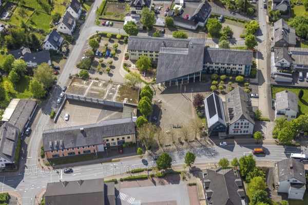 Aerial view, municipal administration town hall Bestwig with solar roof, town hall square, Sparkasse Hochsauerland, Bestwig, Sauerland, North Rhine-Westphalia, Germany, municipal administration, town hall, solar roof, building, solar energy, architecture, city, city centre, administration, public building, institution, energy efficiency, environmentally friendly, village, bank, financial institution, modern architectural style, infrastructure, aerial view, overview, region, commercial building, sustainability, vertical perspective, exterior view, public space