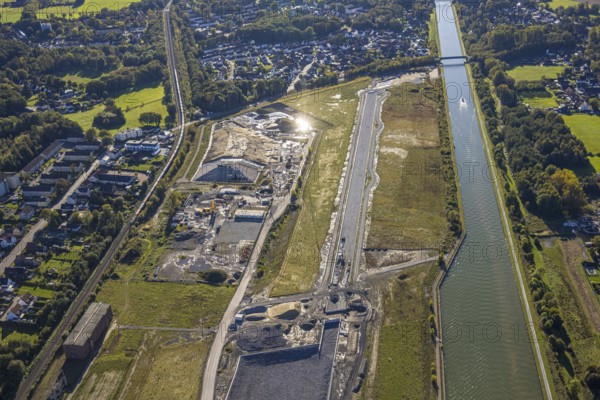 Aerial view, Wasserstadt Aden on the Datteln-Hamm Canal, construction area for planned urban quarter on the site of the former Haus Aden colliery, Oberaden, Bergkamen, Ruhr area, North Rhine-Westphalia, Germany, architecture, construction, construction area, Datteln-Hamm Canal, development, river, terrain, industrial site, infrastructure, canal, land use, landscape, aerial view, modernisation, new construction, planning, regional planning, reurbanisation, urban development, urban planning, urban quarter, top view, transformation, environment, conversion, urban, suburb, water, water town Aden, Haus Aden colliery, geographical, industrial