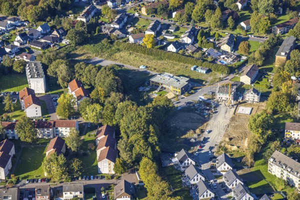 Aerial view, construction site with new building AWO Kita Lippestrolche Kindergarten an der Berliner Straße, Weddinghofen, Bergkamen, Ruhr area, North Rhine-Westphalia, Germany, AWO Kita, work, architecture, construction site, Berliner Straße, concrete, education, development, progress, building, community, sky, infrastructure, engineering, children's facility, kindergarten, construction, cranes, landscape, Lippestrolche, machines, modernisation, new building, panorama, planning, summer, city, day, urban, tools, bricks, social