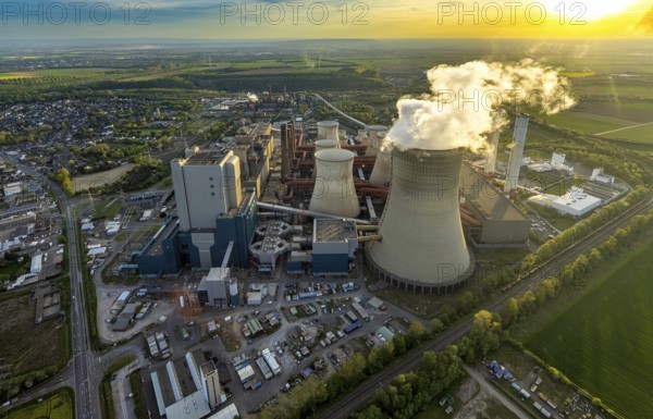 Aerial view, Niederaussem lignite-fired power plant, power plant site of RWE Power AG, cooling towers and smoke clouds, distant view, Bergheim, Rhineland, North Rhine-Westphalia, Germany, lignite-fired power plant, Niederaussem, RWE Power AG, cooling towers, smoke clouds, energy, pollution, industry, power generation, landscape, air pollution, infrastructure, technology, power generation, coal-fired power plant, low-emission, sky, clouds, opencast mining, energy industry, power plant site, energy supply, environment, economy, coal, smoke, chimney, power plant, ecological footprint, sustainability, renewable energies