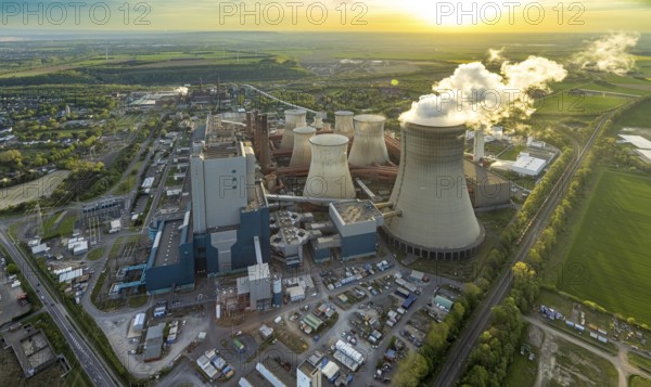 Aerial view, Niederaussem lignite-fired power plant, power plant site of RWE Power AG, cooling towers and smoke clouds, distant view, Bergheim, Rhineland, North Rhine-Westphalia, Germany, lignite-fired power plant, Niederaussem, RWE Power AG, cooling towers, smoke clouds, industry, energy, pollution, power generation, landscape, technology, architecture, infrastructure, air pollution, emissions, environment, power plant site, industrial, skyline, energy production, sustainability, energy source, polluting, energy supply, large-scale plant, panorama
