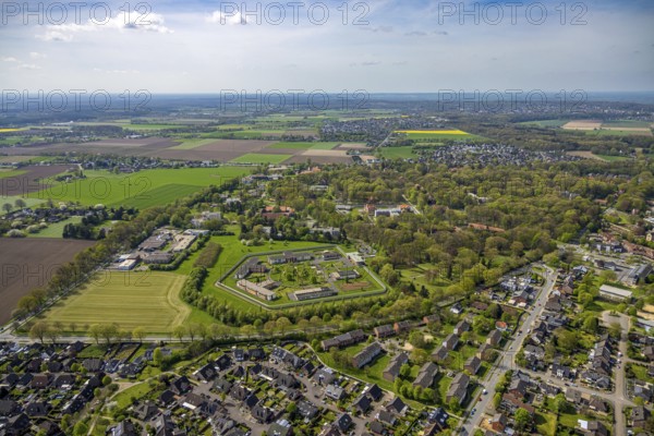 Aerial view, Forensic Psychiatry - LVR Clinic, special psychiatric facilities, circular garden, residential area local view Bedburg-Hau with distant view, Hau, Bedburg-Hau, Lower Rhine, North Rhine-Westphalia, Germany, architecture, treatment, distant view, forensic psychiatry, garden, building, community, health care, green areas, LVR Clinic, landscape, aerial view, medical facility, local view, care, psychiatry, rehabilitation, security, urban, therapy, urban, residential area, circular, rural