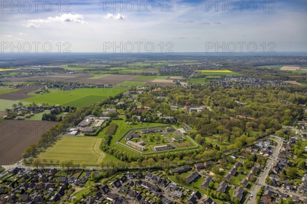 Aerial view, Forensic Psychiatry - LVR Clinic, specialised psychiatric facilities, circular garden, residential area local view Bedburg-Hau with distant view, Hau, Bedburg-Hau, Lower Rhine, North Rhine-Westphalia, Germany, architecture, treatment, village, facility, distant view, forensic psychiatry, garden, building, community, health care, green area, healing, infrastructure, LVR clinic, landscape, panoramic view, panorama, care, safety, settlement, town, urban, therapy, care, residential area, European, rural, medical, overview, public institution