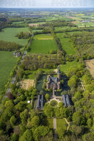 Aerial view, Museum Schloss Moyland, neo-Gothic moated castle and castle park surrounded by meadows and fields and forest, excursion destination on the Lower Rhine, Moyland, Bedburg-Hau, Lower Rhine, North Rhine-Westphalia, Germany, architecture, excursion destination, castle, trees, recreation, fields, leisure, buildings, history, green spaces, idyll, culture, landscape, nature, panorama, park, castle park, sight, daylight, tourism, forest, water, meadows, outdoors, gothic, historic, rural, neo-gothic moated castle