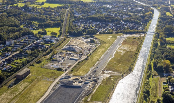 Aerial view, Water City Aden on the Datteln-Hamm Canal, construction area for planned urban quarter on the site of the former Haus Aden colliery, Oberaden, Bergkamen, Ruhr area, North Rhine-Westphalia, Germany, architecture, construction area, construction site, wasteland, Datteln-Hamm Canal, German, development, river, site, green spaces, Haus Aden, industrial history, infrastructure, canal, landscape, modern living, panorama, urban development, urban landscape, urban planning, urban, bird's eye view, Wasserstadt Aden, future project, former colliery, planned urban quarter, regional