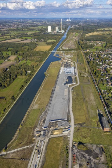 Aerial view, Aden water town on the Datteln-Hamm Canal, construction area for planned urban quarter on the site of the former Haus Aden colliery, Oberaden, Bergkamen, Ruhr area, North Rhine-Westphalia, Germany, Aden, architecture, construction area, construction projects, Datteln-Hamm Canal, development, river, area, site, waters, Haus Aden, industrial history, infrastructure, investment, canal, landscape, aerial view, modernisation, perspective, planning, region, settlement, urban planning, structure, transformation, water town, future, German, former colliery, planned urban quarter, urban, urban landscape