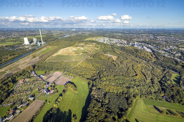 Aerial view, Bergkamen power station and Großes Holz slag heap, forest area on the Datteln-Hamm Canal, Weddinghofen, Bergkamen, Ruhr area, North Rhine-Westphalia, Germany, architecture, view, building, slag heap, Datteln-Hamm Canal, energy, elevation, recreation area, Europe, river, terrain, geography, water, slagheap Großes Holz, sky, horizon, industry, industrial landscape, infrastructure, canal, power station, landscape, nature, panorama, region, power generation, structure, environment, vegetation, forest, woodland, scenic, technical, topographical, urban environment