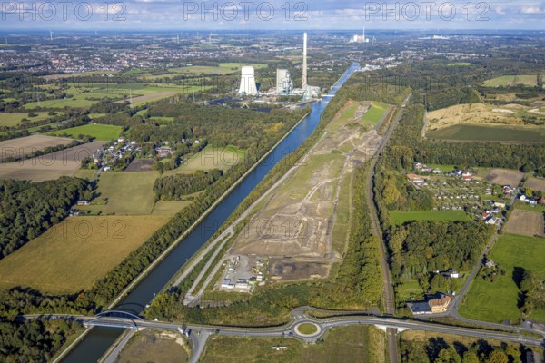 Aerial view, Bergkamen power station, Haus Aden 1 slagheap, Landwehrstraße nature reserve on the Datteln-Hamm Canal, distant view and blue sky with clouds, Weddinghofen, Bergkamen, Ruhr area, North Rhine-Westphalia, Germany, architecture, Datteln-Hamm Canal, energy, conservation, distant view, building, geography, green space, industry, infrastructure, canal, power station, landscape, landscape photography, Landwehrstraße, nature, nature reserve, panorama, summer, structure, daylight, technology, environment, clouds, cloud formation, blue sky, above, regional
