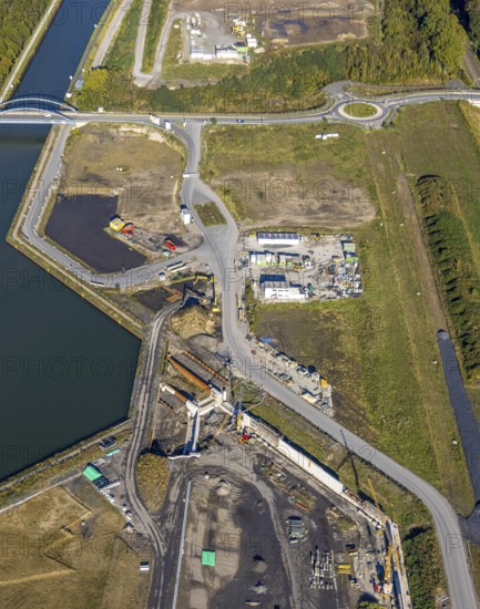Aerial view, Water City Aden on the Datteln-Hamm Canal, construction area for planned urban quarter on the site of the former Haus Aden colliery, close-up on Jahnstraße, Oberaden, Bergkamen, Ruhr area, North Rhine-Westphalia, Germany, Aden, architecture, construction area, construction project, Datteln-Hamm Canal, river, site, Haus Aden, industrial history, industrial heritage, infrastructure, Jahnstraße, canal, landscape, modernisation, perspective, planning, settlement development, urban development, structure, technology, water town, former colliery, planned urban quarter, historic site, above, urban change, urban area, urban