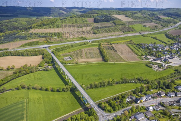 Aerial view, Ruhr valley bridge Velmede and motorway A46 junction Bestwig, tree plantations meadows and fields, Velmede, Bestwig, Sauerland, North Rhine-Westphalia, Germany, Ruhr valley bridge Velmede, motorway A46, junction Bestwig, tree plantations, meadows, fields, bridge, traffic, infrastructure, landscape, aerial view, nature, motorway, road, agriculture, rural, green area, panorama, areas, trees, regions, traffic junction, summer, daylight, architecture, bridge construction, areas, village, routing