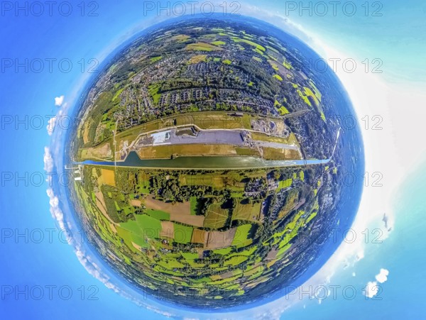 Aerial view, water town Aden on the Datteln-Hamm Canal, construction area for planned urban quarter on the site of the former Haus Aden colliery, earth globe, fisheye image, fisheye image, 360 degree image, tiny world, little planet, fisheye image, Oberaden, Bergkamen, Ruhr area, North Rhine-Westphalia, Germany, 360 degree, abstract, Aden, architecture, construction area, Datteln-Hamm Canal, river, geography, Haus Aden, industrial area, landscape, Little Planet, aerial view, new development area, panorama, perspective, region, panoramic view, urban development, urban planning, urban quarter, structural change, Tiny World, urbanisation, water town, vision of the future, former colliery, innovative, creative