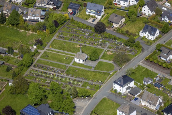 Aerial view, Nuttlar cemetery burial ground and cemetery chapel, Zum Kreuzberg, Nuttlar, Bestwig, Sauerland, North Rhine-Westphalia, Germany, cemetery, burial ground, cemetery chapel, landscape, cemetery grounds, architecture, chapel, building, gravestones, gravesites, peace, nature, green spaces, park, mountains, trees, peaceful, rural, view, sky, clouds, picturesque, religious, commemoration, historical site, contemplation, devotion, village, region, perspective, photography