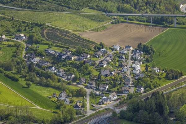 Aerial view, residential area local view district Dümel, behind Ruhr valley bridge Bermecke of the federal road, B480n, Nuttlar, Bestwig, Sauerland, North Rhine-Westphalia, Germany, residential area, local view, district Dümel, Ruhr valley bridge, Bermecke, federal road, building, road, traffic connection, bridge, infrastructure, landscape, village, houses, settlement, municipality, environment, nature, aerial view, bird's eye view, rural, European