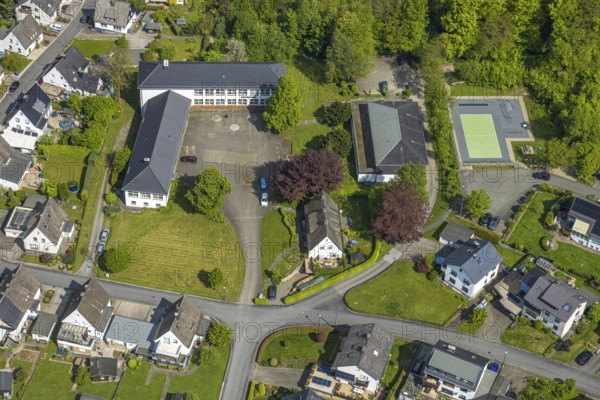 Aerial view, Anne Frank School and sports hall gymnasium, football pitch Auf dem Schilde, Ostwig, Bestwig, Sauerland, North Rhine-Westphalia, Germany, Anne Frank School, sports hall, gymnasium, football pitch, Auf dem Schilde, building, school building, sports field, exterior view, daylight, architecture, educational institution, schoolyard, leisure, community, infrastructure, village, landscape, sport, recreation, public facilities, environment, village life